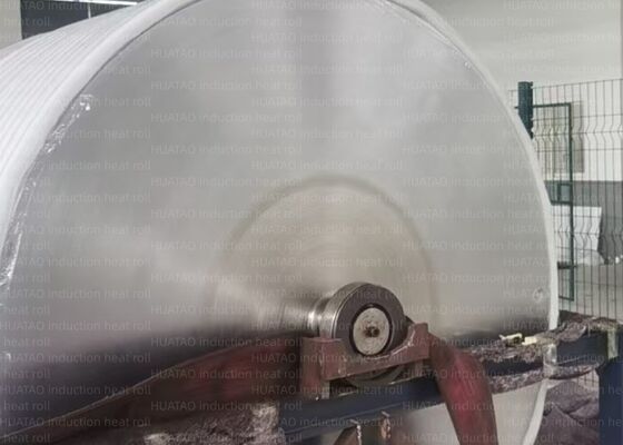 Finitura a specchio con cromatura dura. Rullo riscaldante a induzione elettromagnetica. Velocità lineare massima 1000 mm. Pressione lineare massima 400 kNm.
